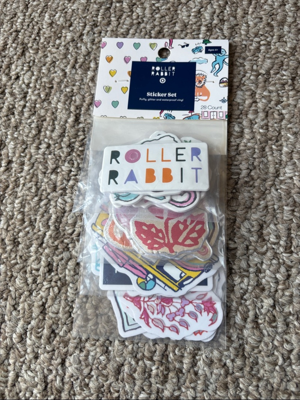 Roller Rabbit navy blue sticker pack backing with colorful heart accents